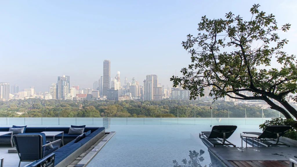 infinity pool and view of the city of bangkok at so sofitel