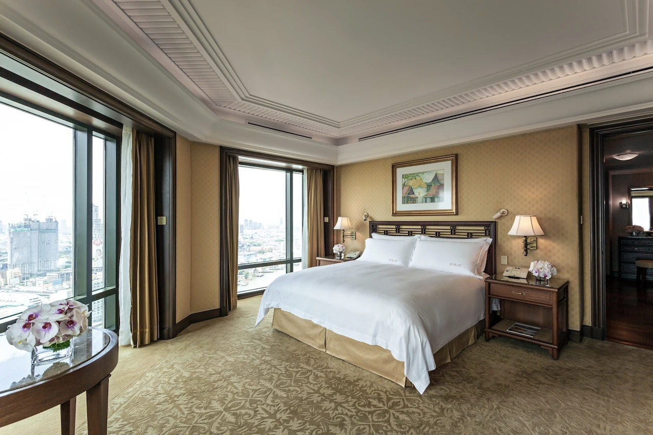 bedroom in the grand terrace suite at the peninsula bangkok