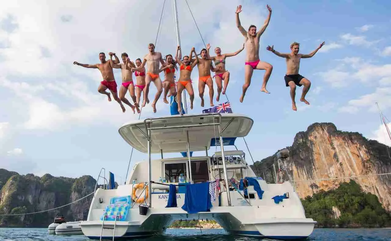 people jumping for a yacht during a boat party in Pattaya