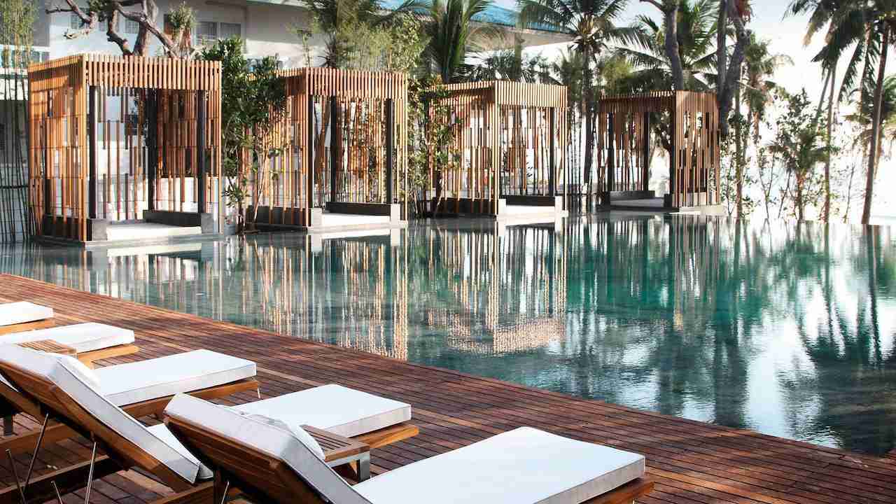 pool view and sunbeds from Cape Nidhra hotel in Hua Hin Thailand