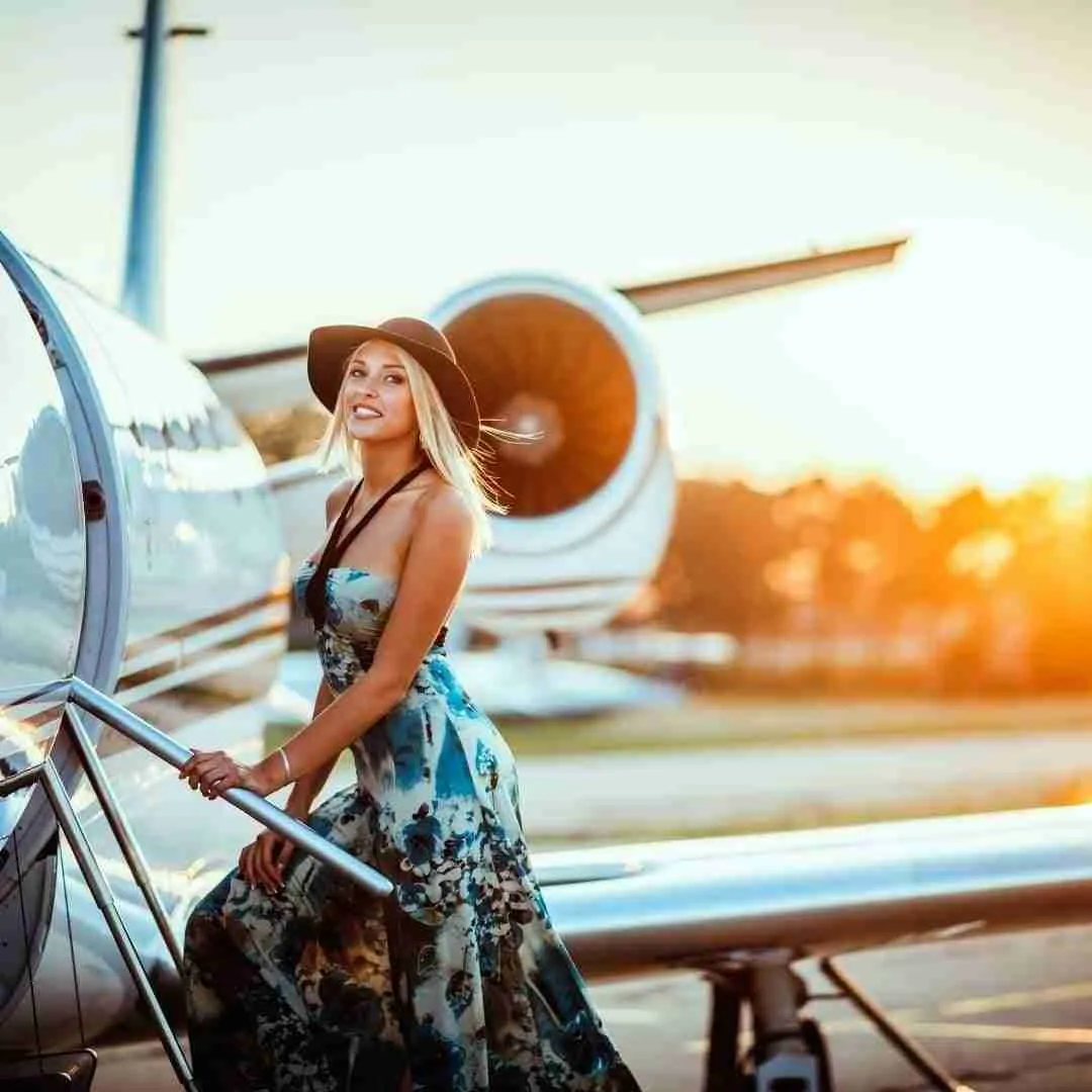 beautiful young girl onboarding a private jet