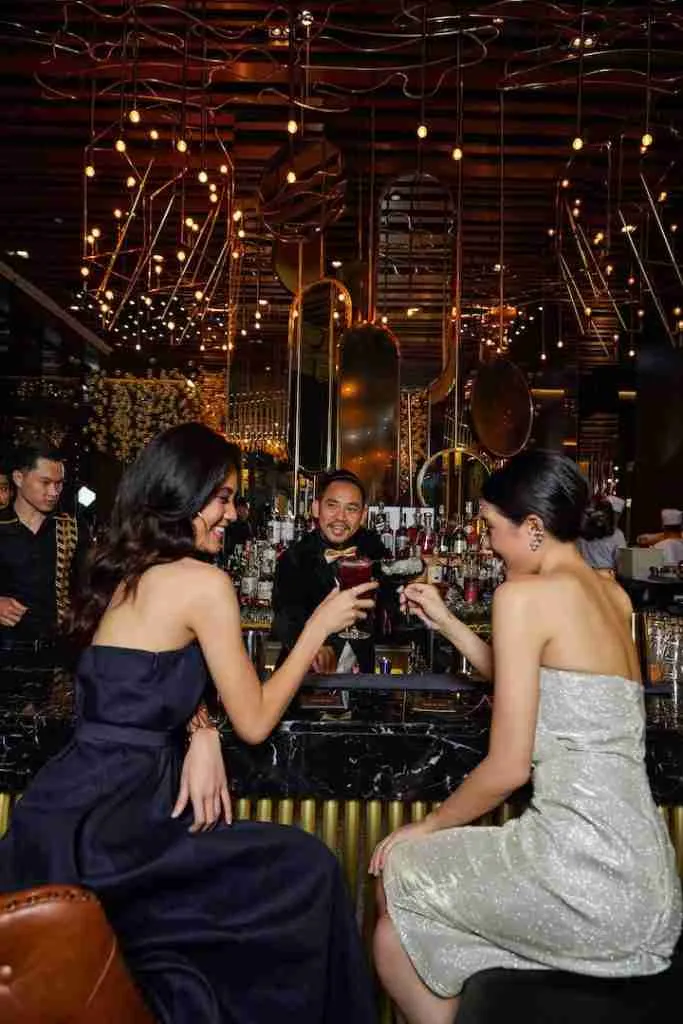 girls drinking cocktails at SEEN rooftop bar in Bangkok