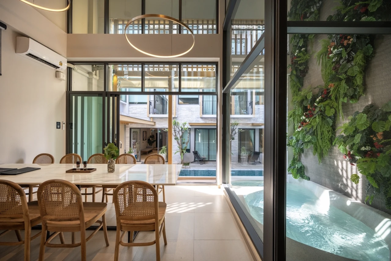 living room and pool at shan villas sukhumvit in bangkok