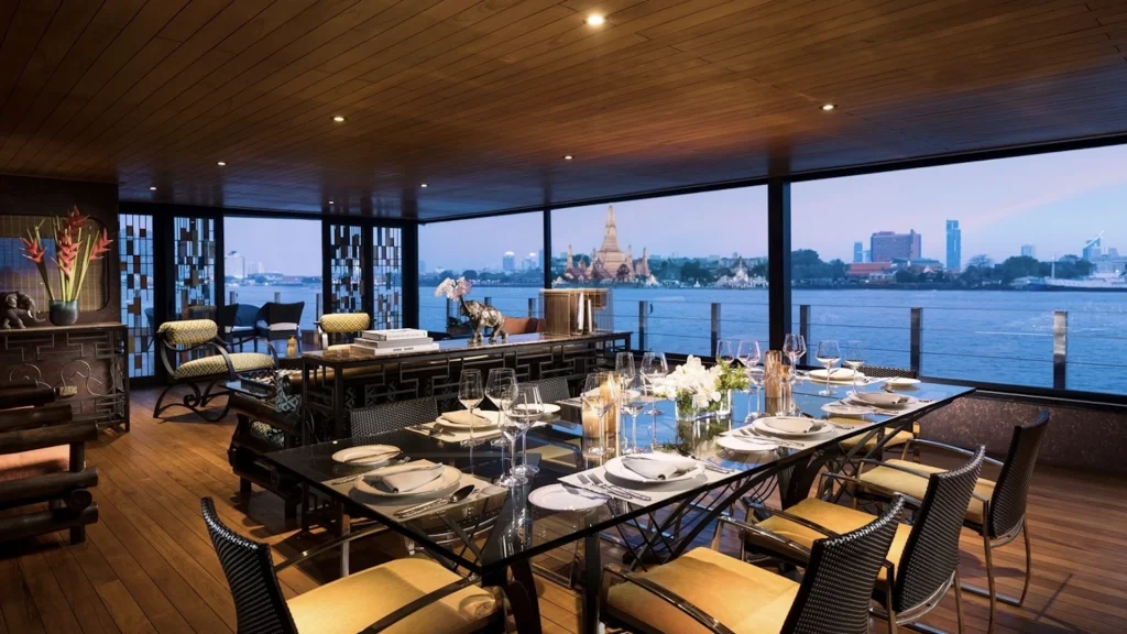 main dinning room of loy pela voyages luxury dinning room and view on the river in bangkok