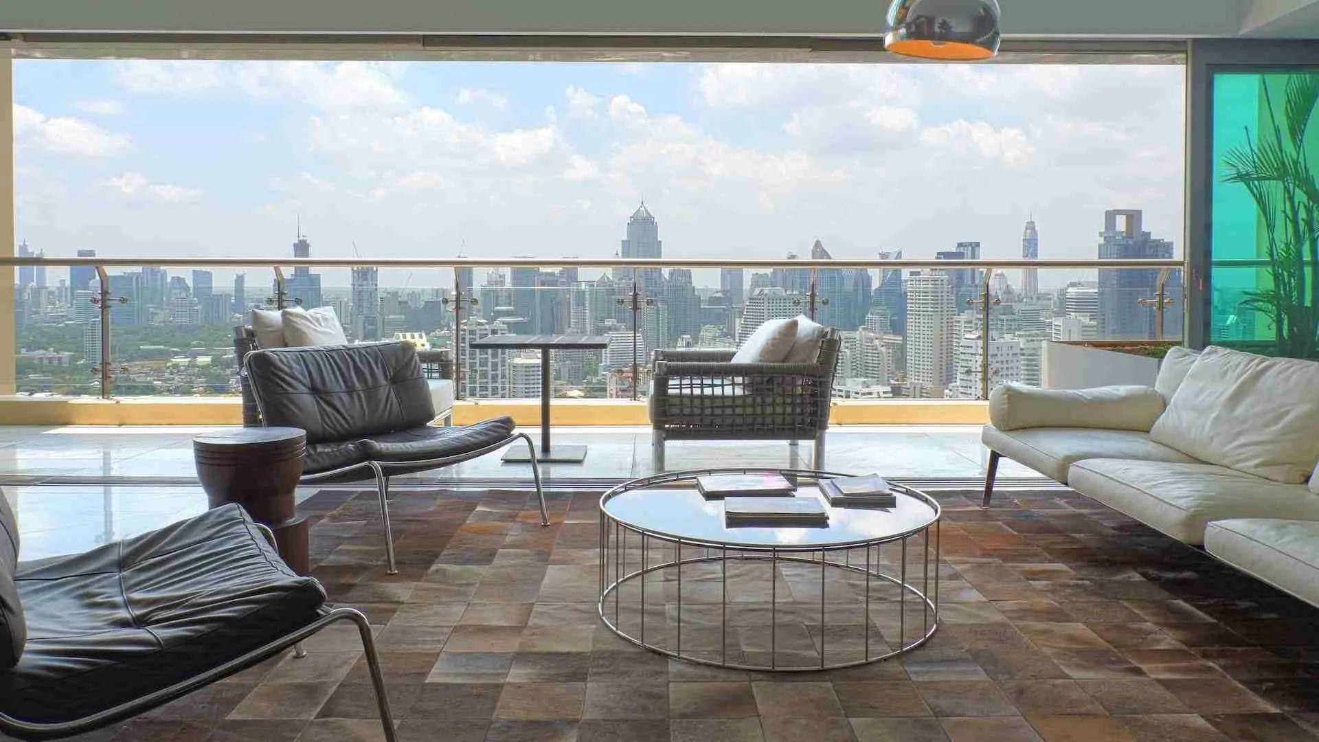 view over Bangkok from the living room of a luxury penthouse
