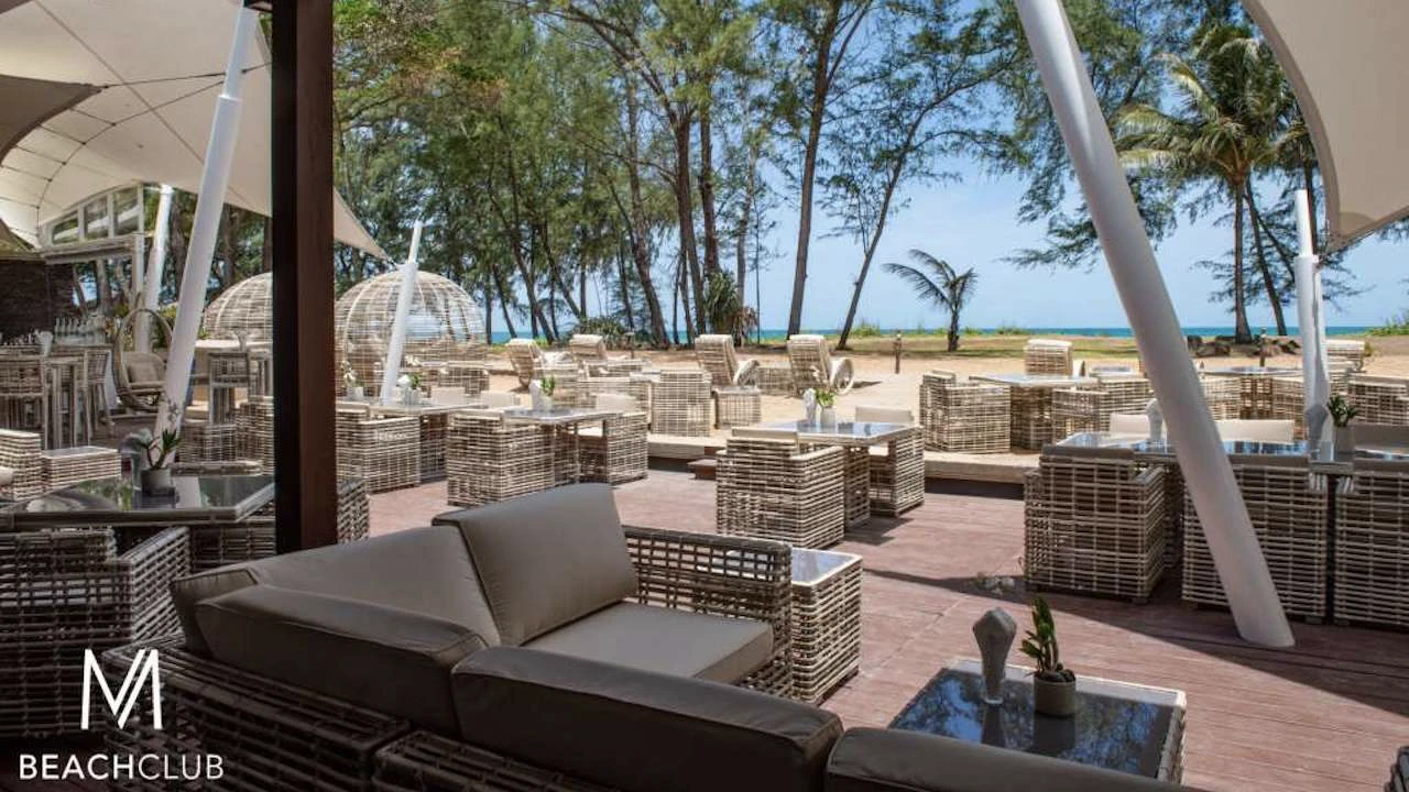 chairs near the beach at m beach club in phuket
