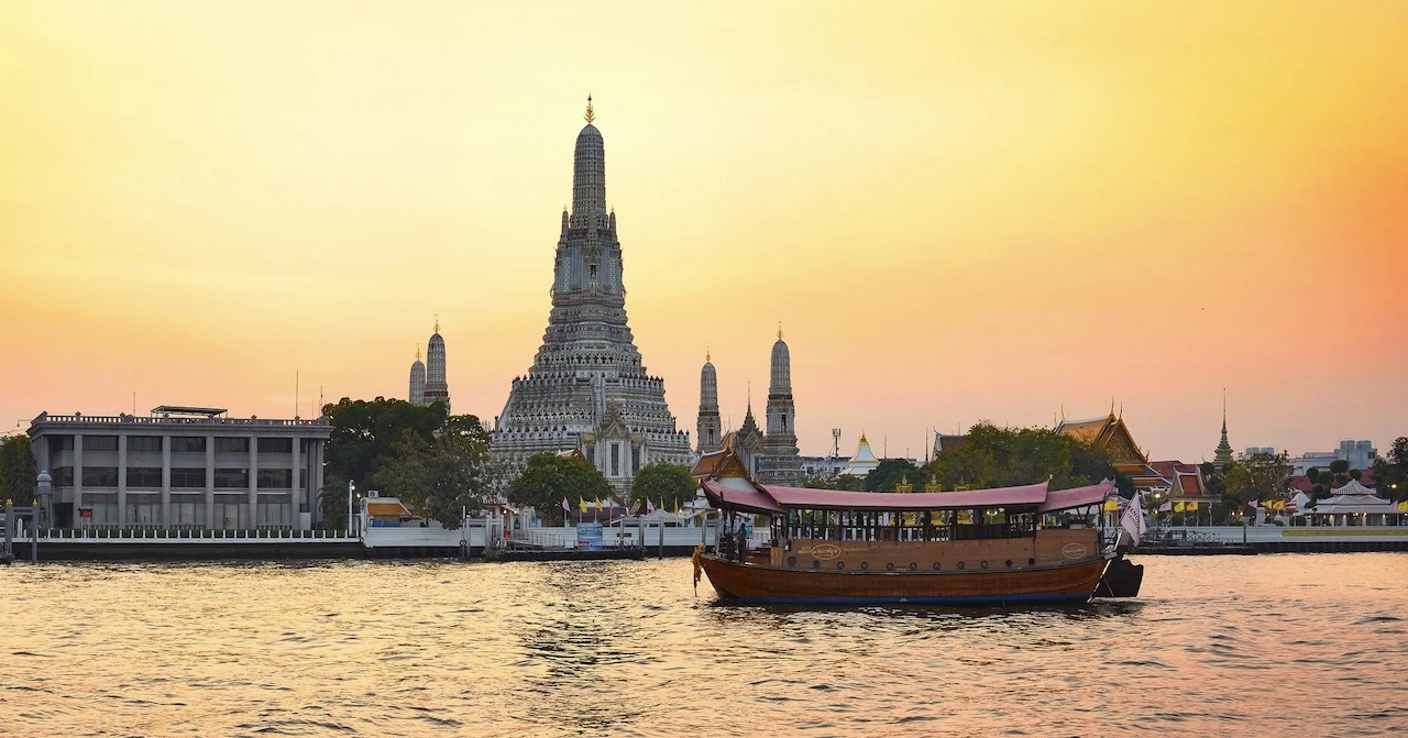 view of manohra cruise boat in the evening in bangkok