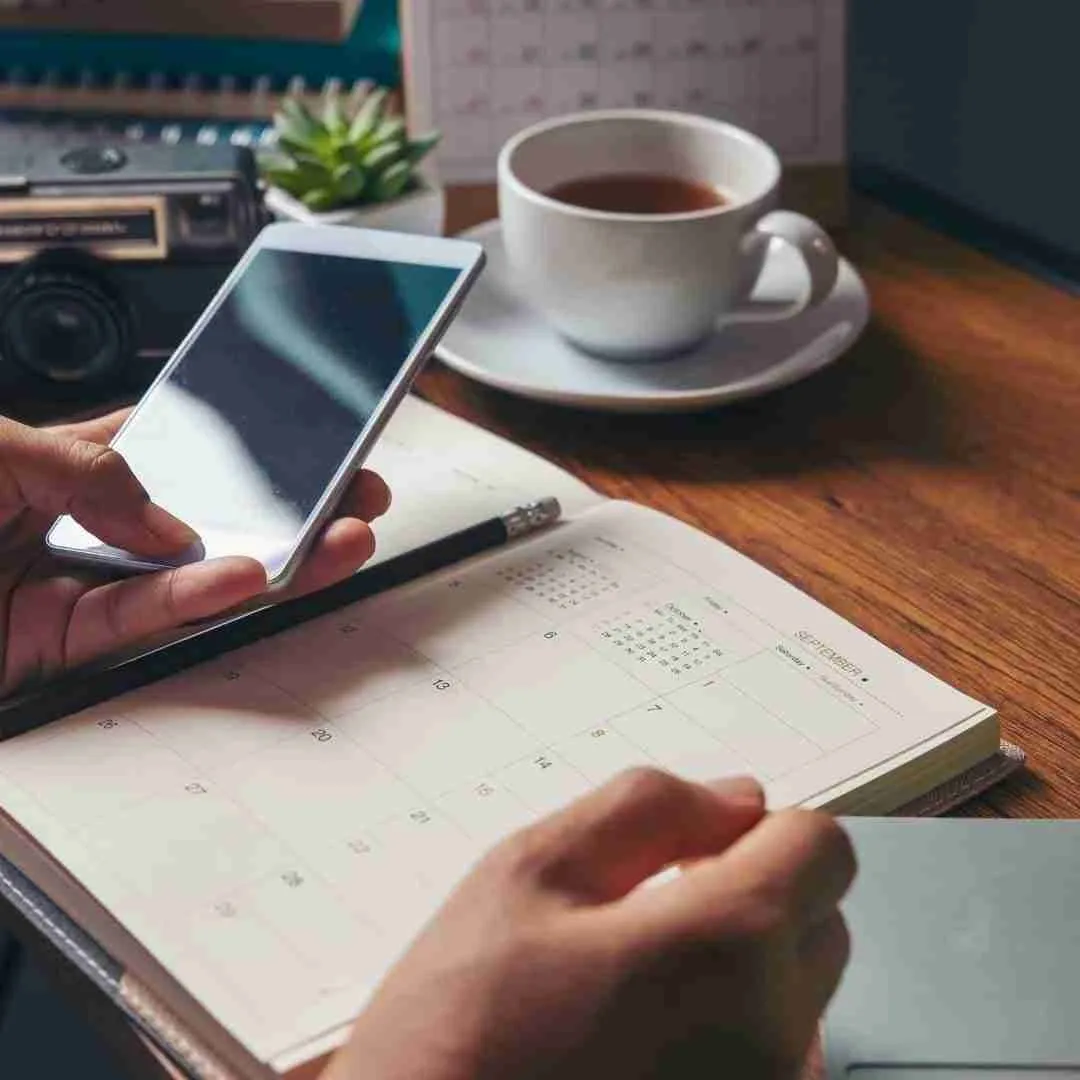 personal assistant working on a schedule for her client