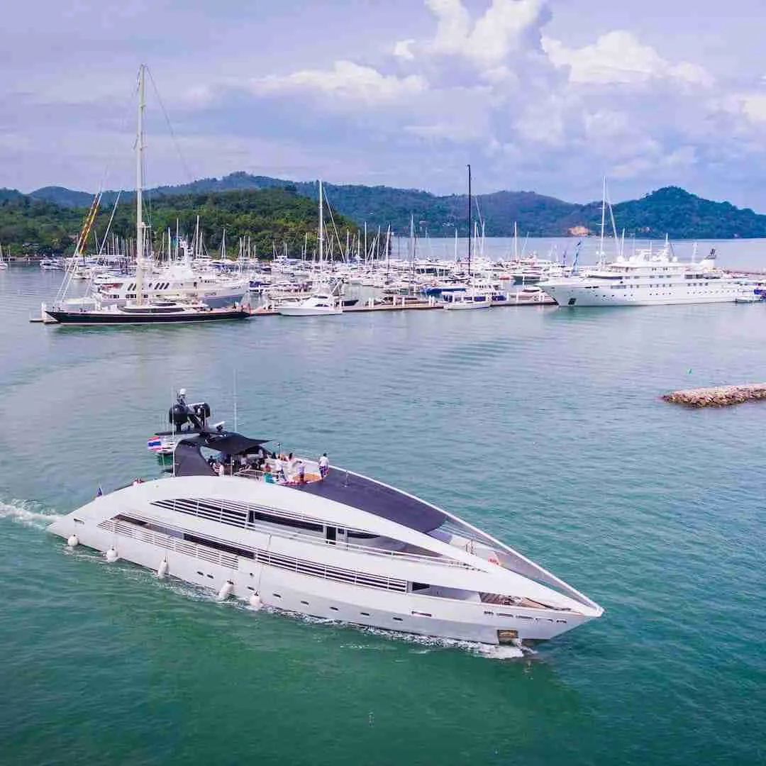 marina in Phuket with luxury yachts and the Ocean Emerald Superyacht