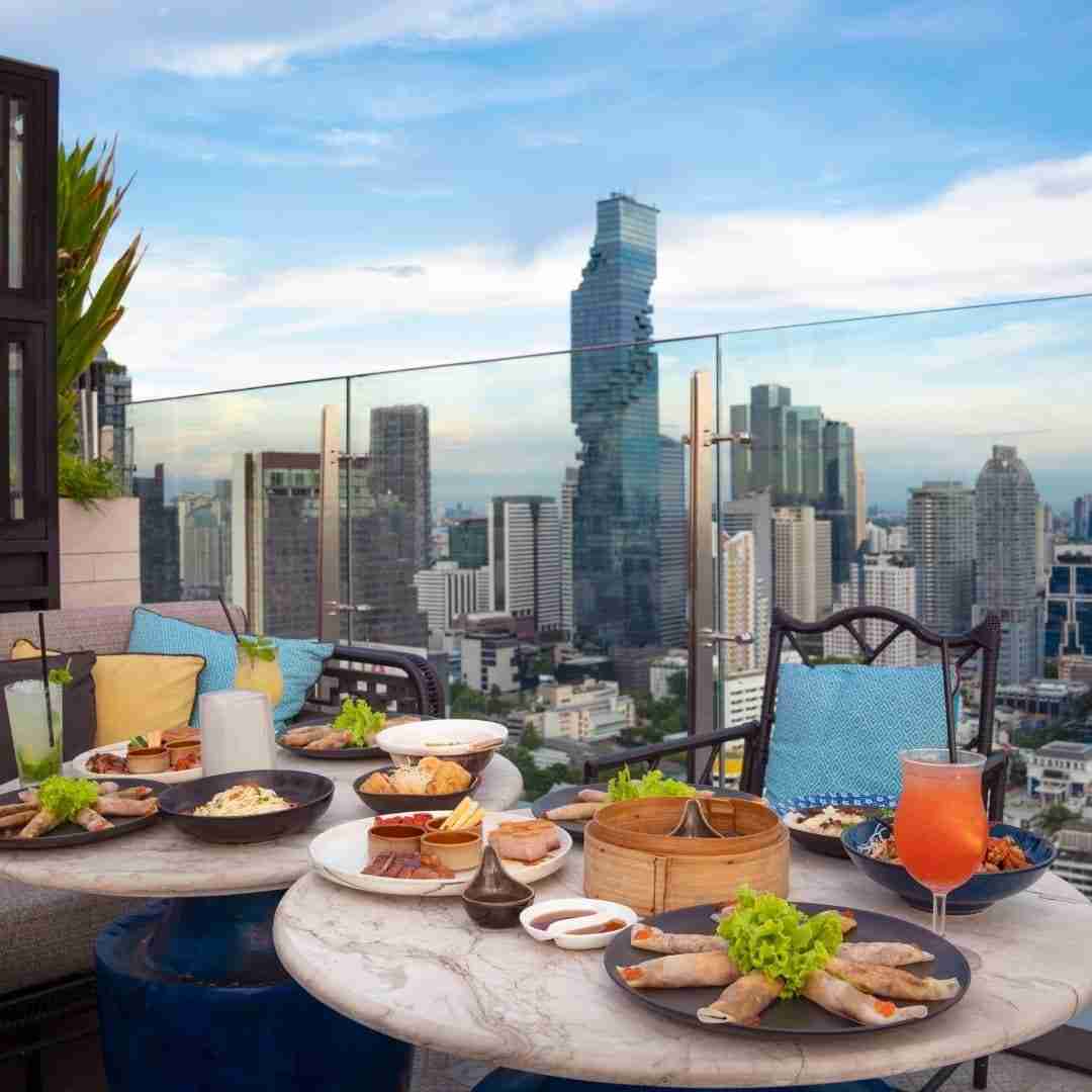 rooftop brunch in Bangkok with view over the Mahanakhon tower