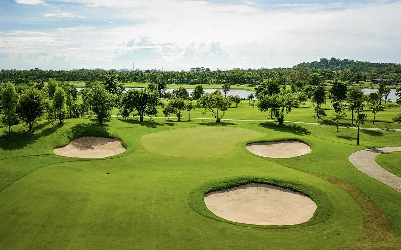 view of siam country club bangkok course with sand and trees