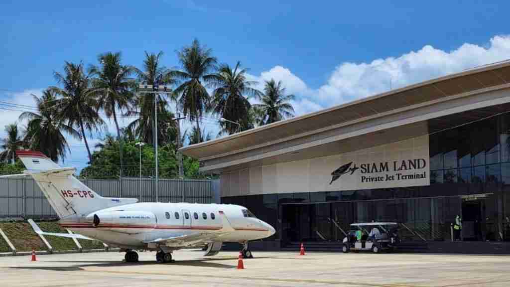 private jet charter parked in front of Siam Land Private Jet Terminal In Phuket