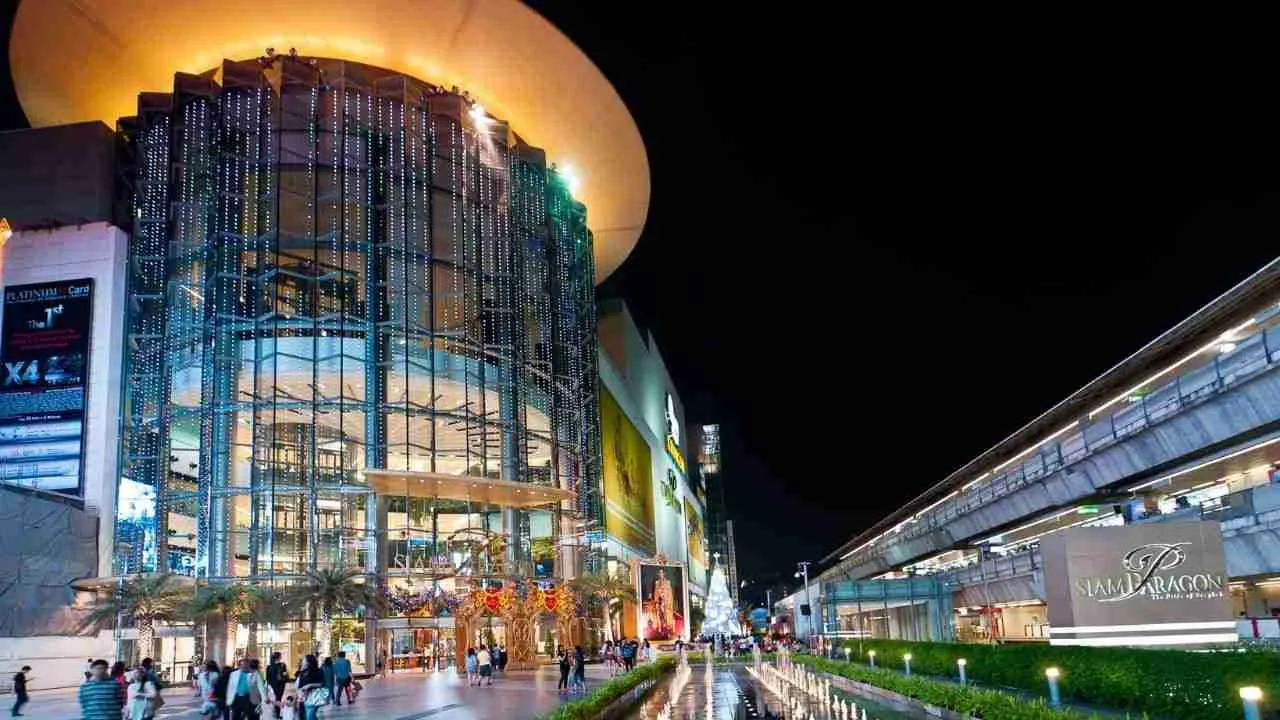 entrance of Siam Paragon mall in Bangkok at night