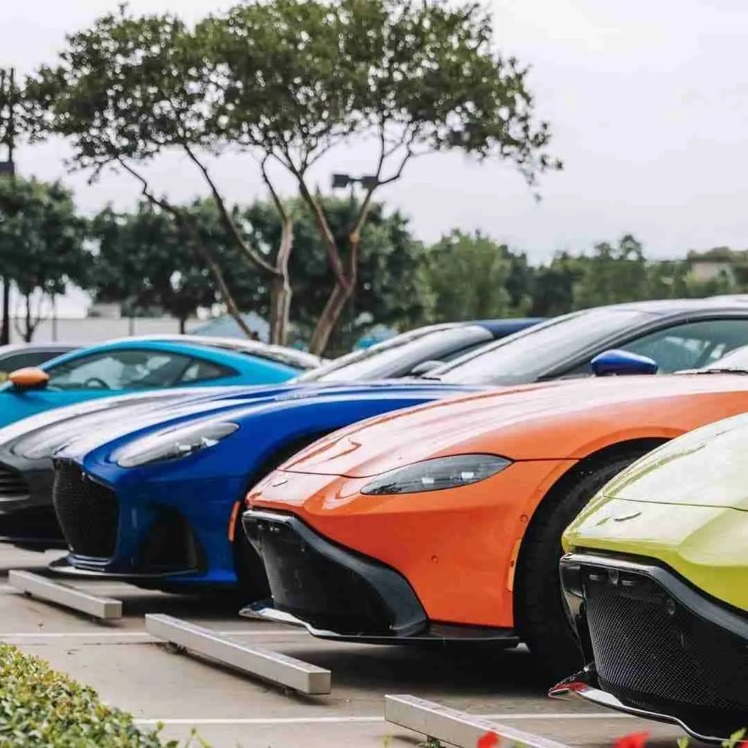 front of supercars parked next to each other