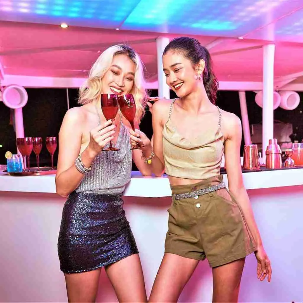 beautiful Thai girls drinking at a bar in Phuket