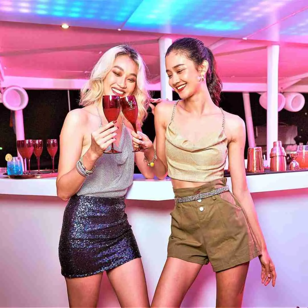 beautiful Thai girls drinking at a bar in Phuket