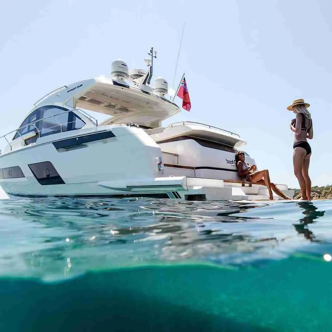 girls at the back of a yacht in Thailand