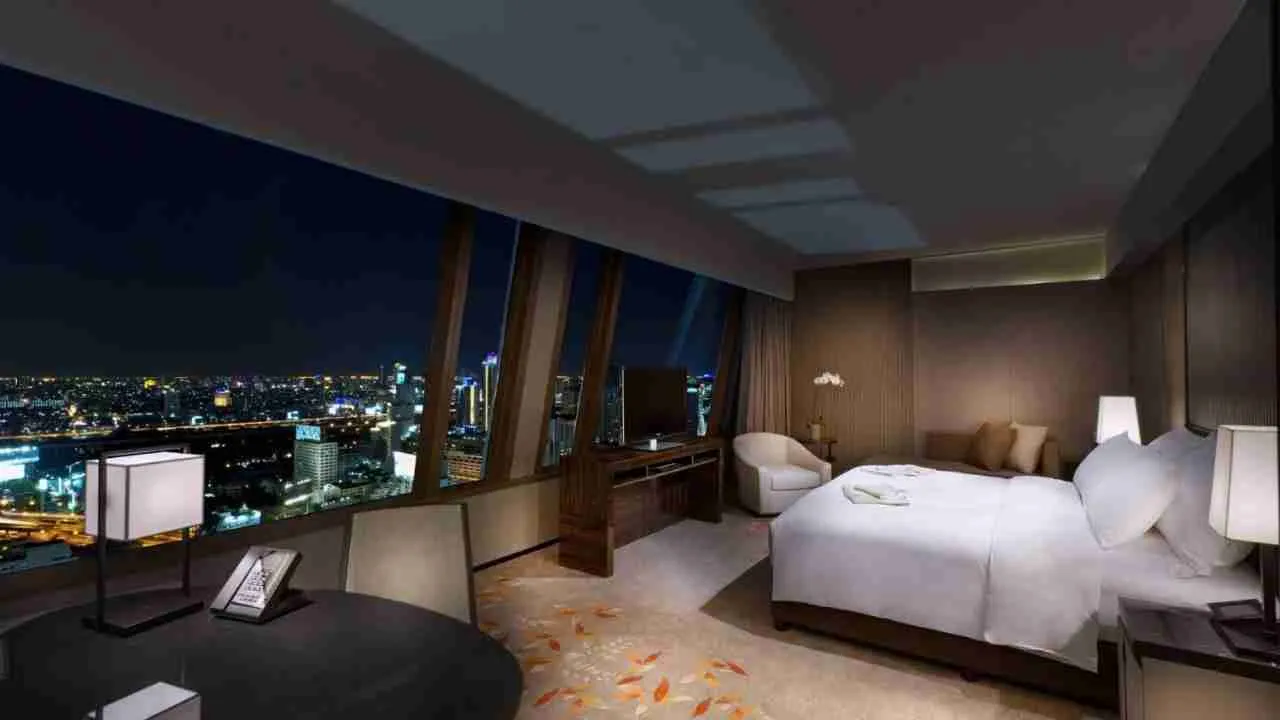 bedroom view at night from The Okura Prestige Bangkok