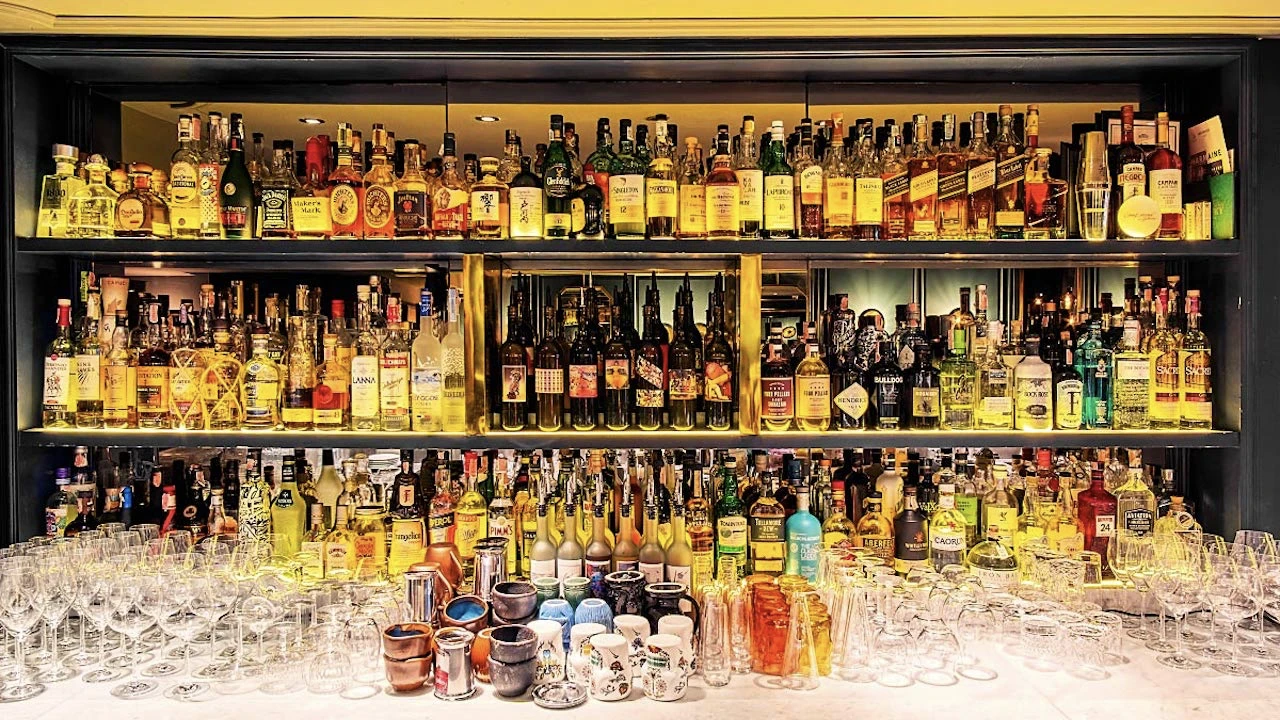 bottles collection at vesper bar in bangkok